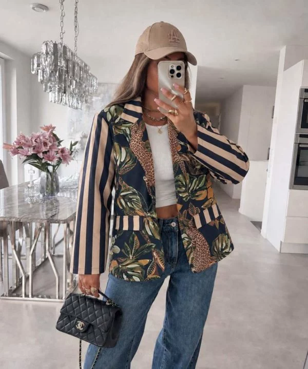 Annora dark blue-black and beige striped-sleeve tropical-print blazer, model front view