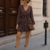 EA-CH338-4 Apolline plum and pale pink paisley mini dress, standing front view showing gathered waist