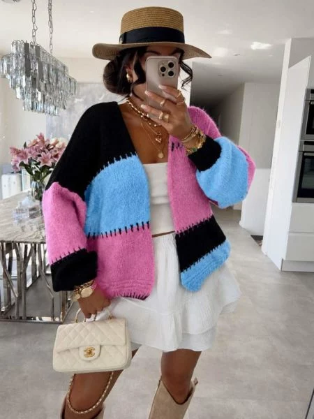 IF-119-1 Marietta pink, blue and black block-knit cardigan, model front view