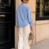 EA-CH161-2 Lison blue blouse, plain rear view and curved hem