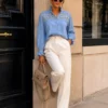 EA-CH161-1 Lison blue blouse, front view of patterned yoke and ruffle cuffs